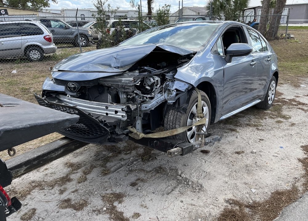 Damaged car for junk removal